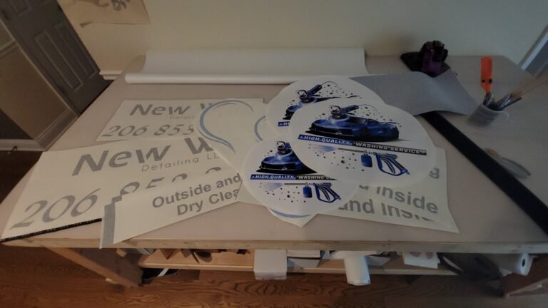 Cutting vinyl signs with company name and number info