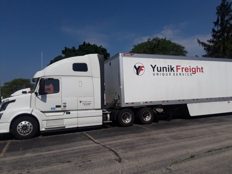 Yunik Freight truck during sign application
