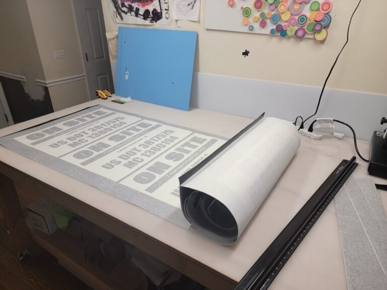 Printing US DOT numbers on vinyl sheet On Site