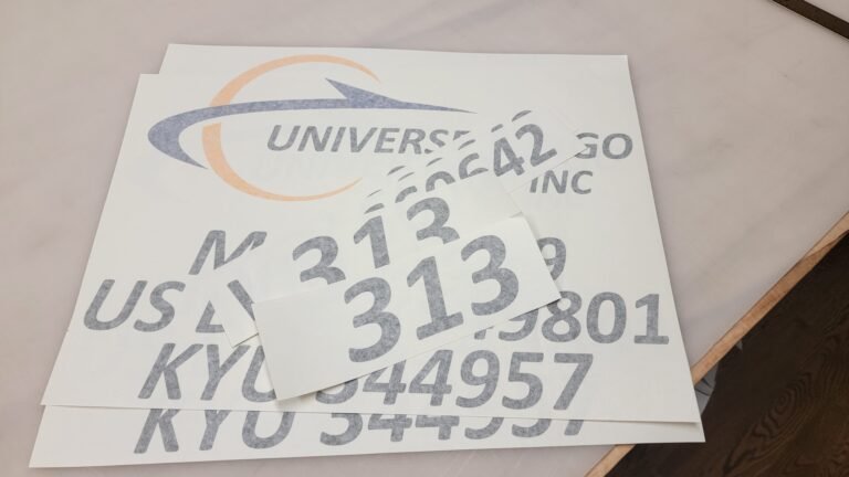 Completed door signs for Universal Trucking